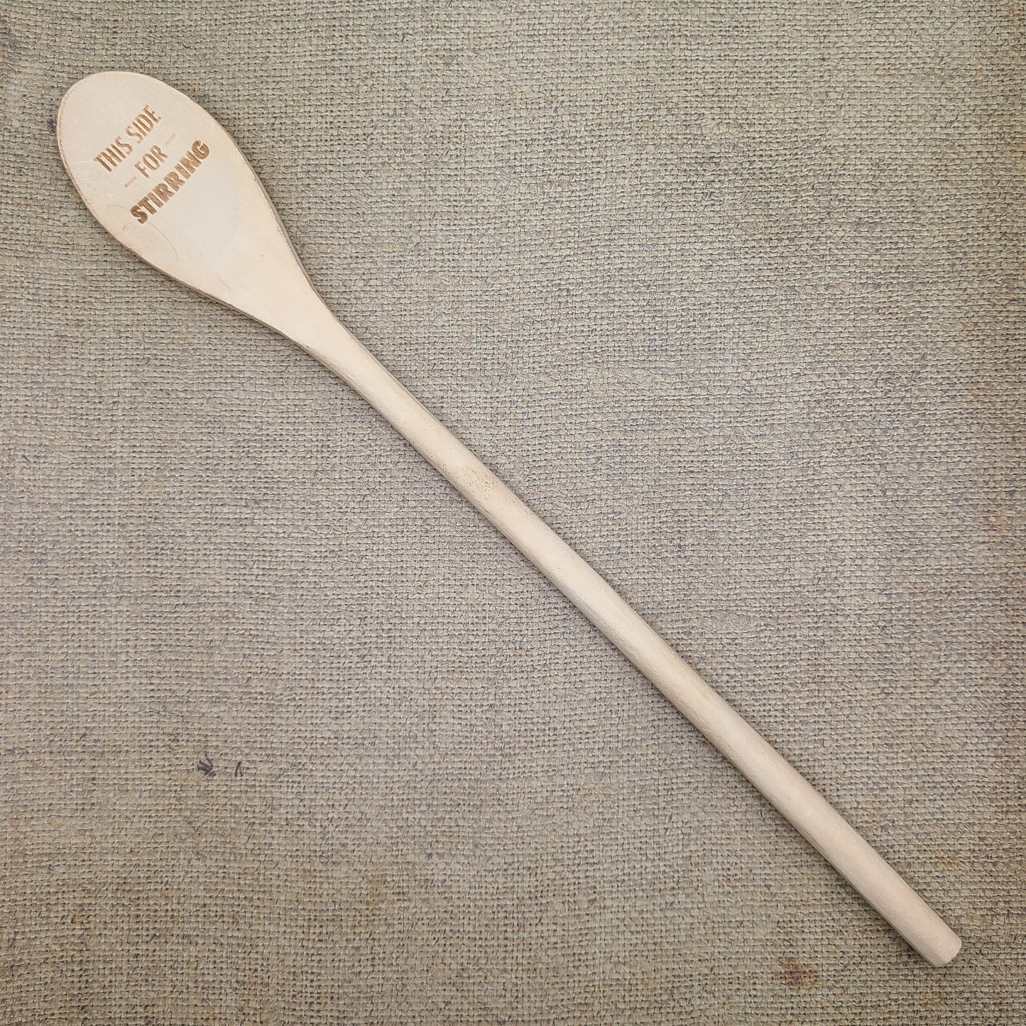 "This side for stirring/This side for spanking" wooden spoon