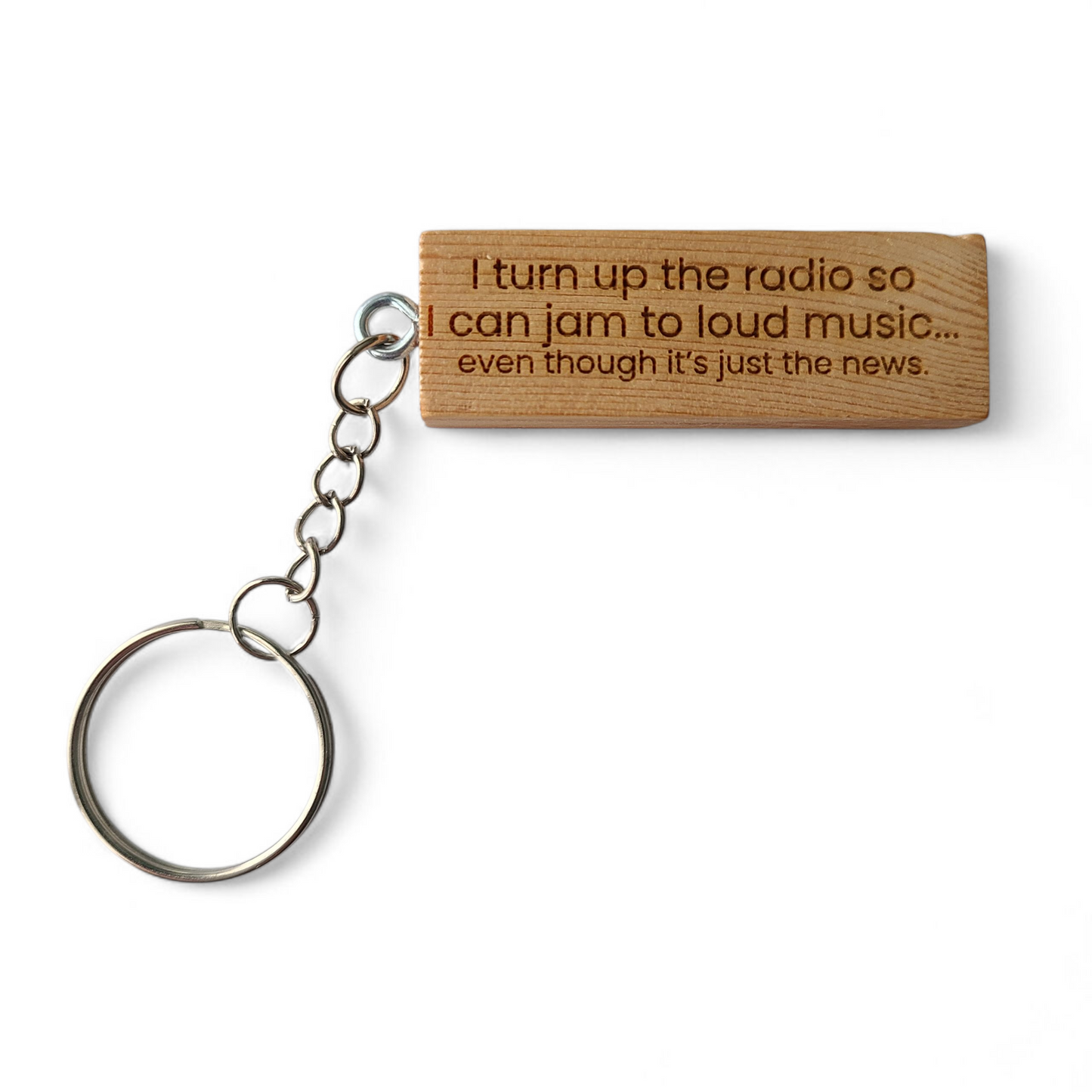"I turn up the radio so I can jam to loud music...even though it's just the news." keychain