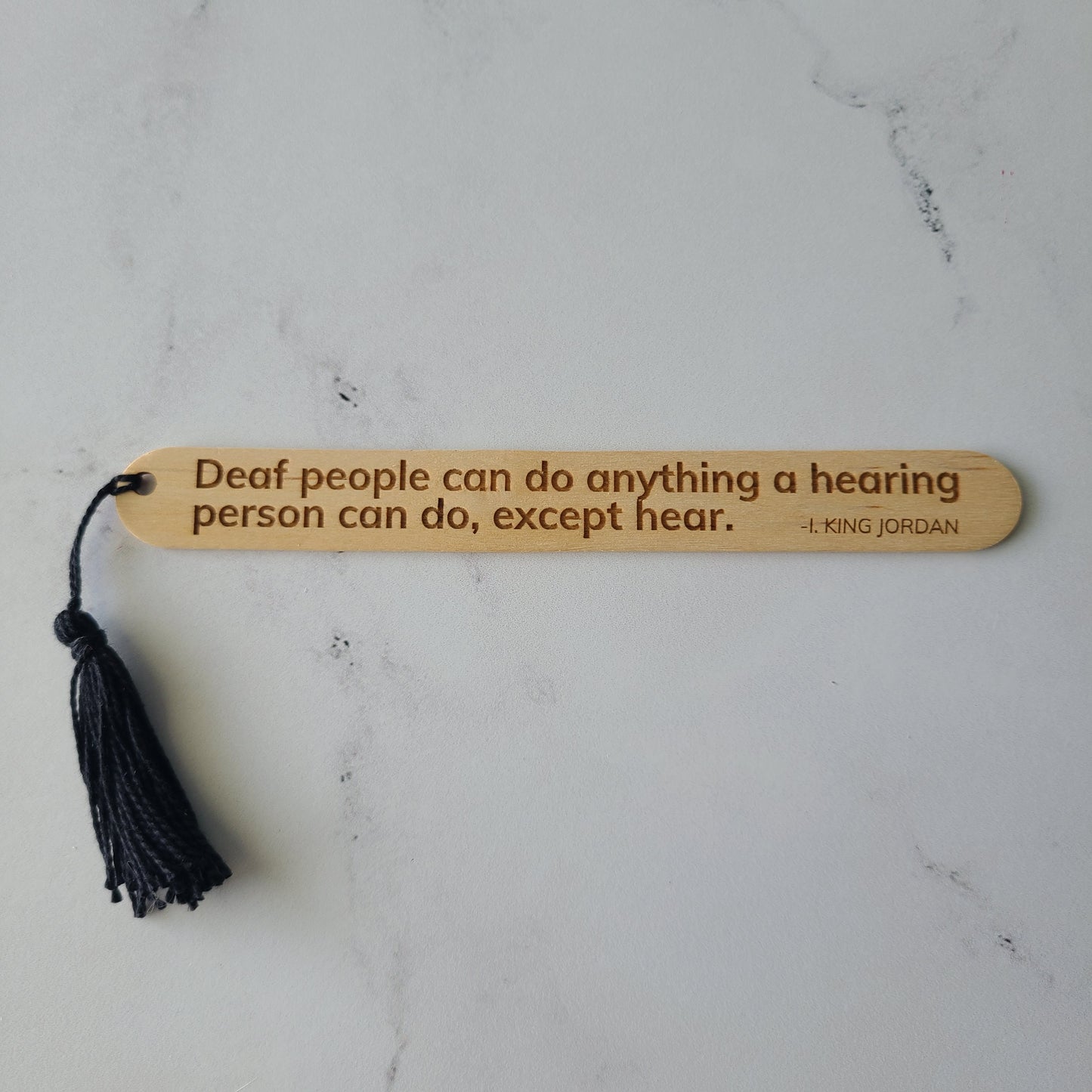 "Deaf people can do anything a hearing person can do, except hear. - I. King Jordan" popsicle bookmark